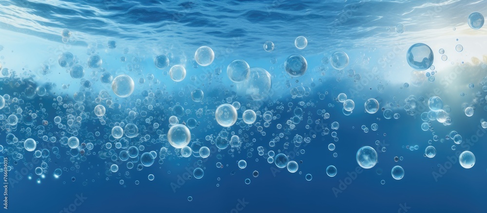 A multitude of bubbles drift in the azure liquid, creating a mesmerizing display of electric blue spheres against the watery font