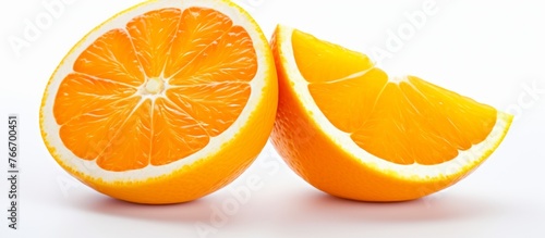 Four halves of citrus fruits including Valencia orange, Clementine, Rangpur, and Bitter orange are arranged on a white surface