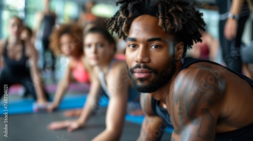 A man with dreadlocks doing yoga poses in a gym, AI