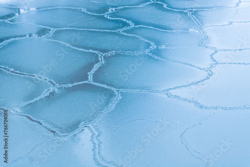 Fotografi Blue ice floes on frozen ocean