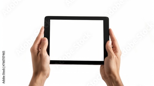Human hands holding digital tablet with a white blank screen photo