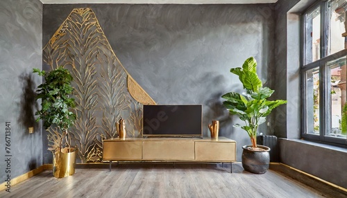 Tv cabinet, gray and gold detailed walls, modern plant. Modern and minimalist looking