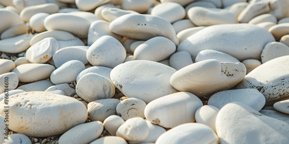 Fototapeta premium Texture of white sea stones close-up, round smooth stones for design, background