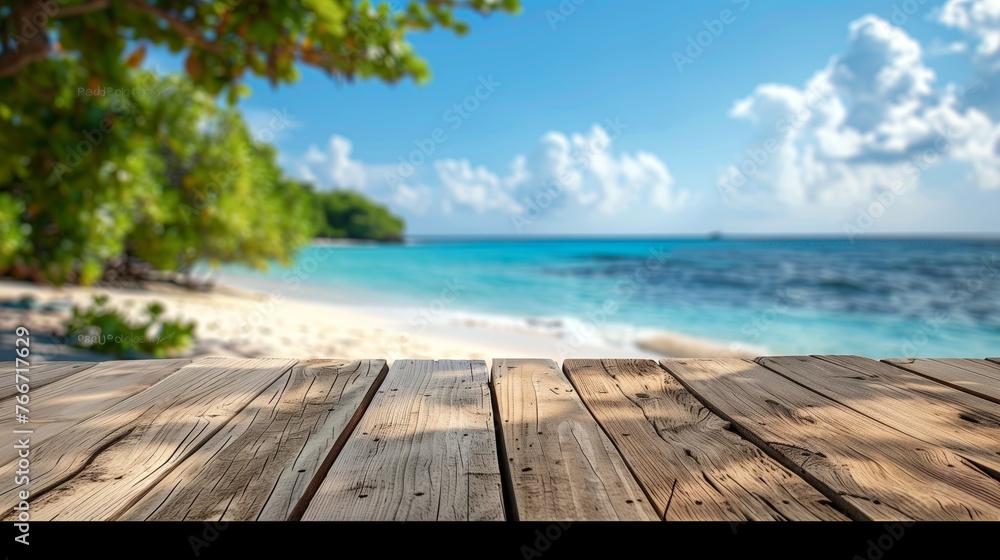 Top of wood table with blurred sea and coconut tree background Top of wood table with blurred sea and coconut tree background