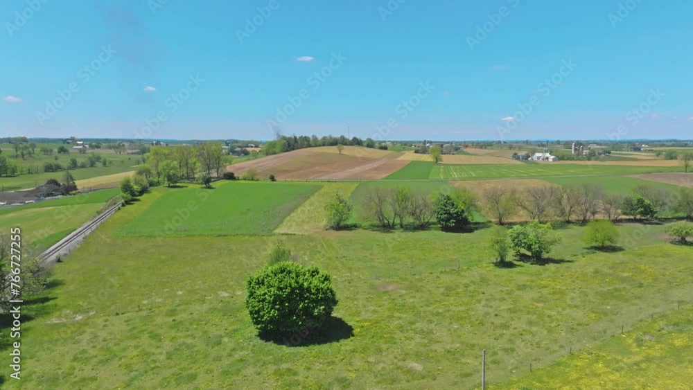 Aerial View of Rural America Farmlands with Patch Work of Colors on a Beautiful Sunny Day Aerial View of Rural America Farmlands with Patch Work of Colors on a Beautiful Sunny Day
