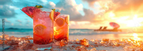 Iced cocktails on a beach at sunset, with golden light reflecting on the water and a serene sea backdrop.