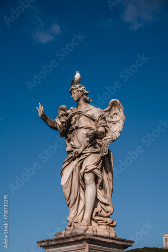 large statue with blue sky