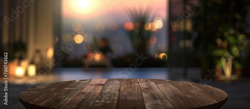 Coffee table is empty in the evening against a blurred background, with space for text.