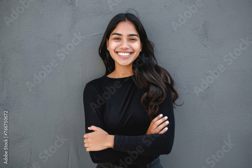 A young Latin woman with a pleasant smile