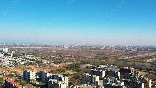 Wallpaper Mural Aerial view of Islamabad cityscape with the skyline towards Rawalpindi with Srinagar highway and Metro station visible behind the residential buildings Torontodigital.ca