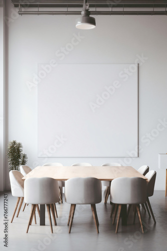 A minimalist gray meeting room with a large whiteboard and a blank white empty frame.