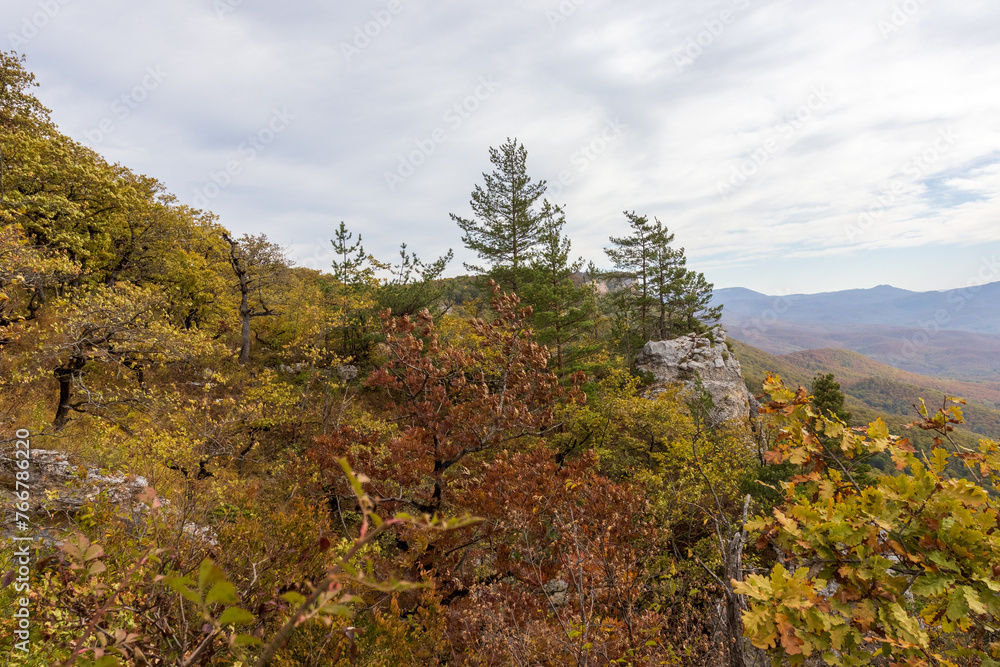 Walking in the highlands at the beginning of the autumn season, ,mountain panorama, nature in anticipation of autumn, cloudy day Walking in the highlands at the beginning of the autumn season, ,mountain panorama, nature in anticipation of autumn, cloudy day