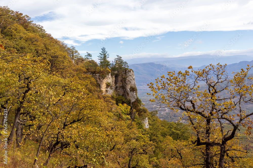 Walking in the highlands at the beginning of the autumn season, ,mountain panorama, nature in anticipation of autumn, cloudy day Walking in the highlands at the beginning of the autumn season, ,mountain panorama, nature in anticipation of autumn, cloudy day