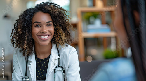 Medicine, profession and healthcare concept - happy smiling african american female doctor in white coat with stethoscope with room for text copy space