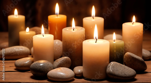 Background of burning candles and stones