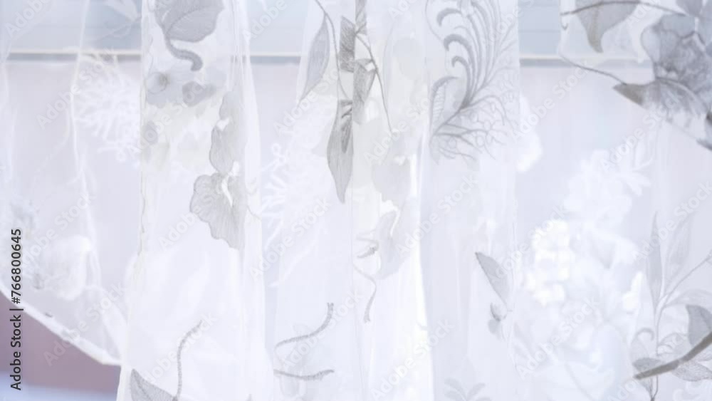 Wedding dress hanging in front of window Wedding dress hanging in front of window