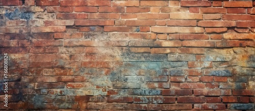 A detailed view of a brick wall showing signs of age and wear  with remnants of faded paint on the surface