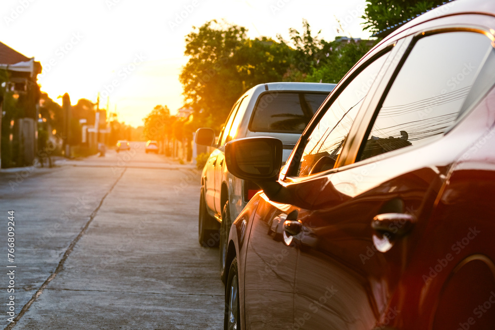 Obraz premium close up car on street automotive roadtrip on sunset background for transport, travel of nature to vehicle auto landscape light the sun for travel journey trip summer and lifestyle.