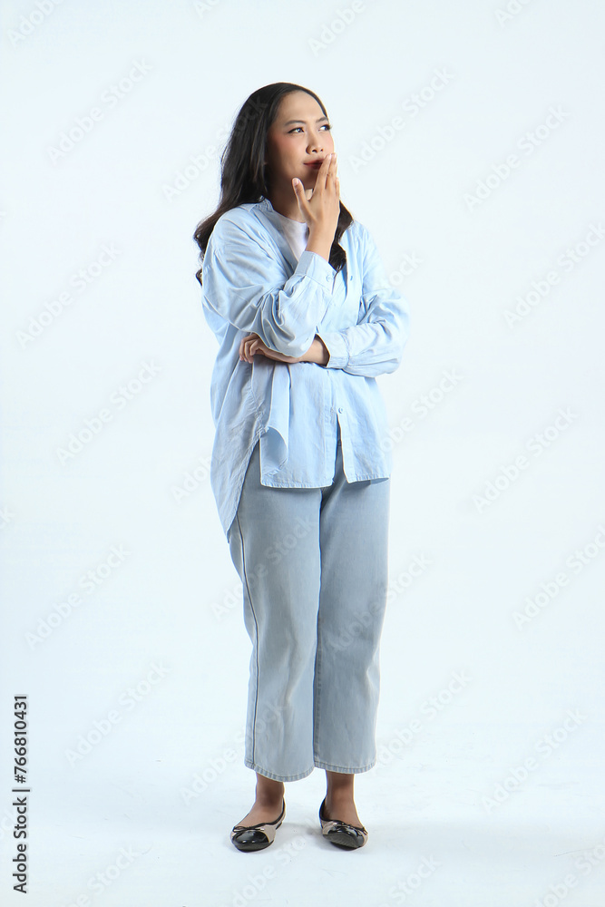 full lengght shoot of asian indonesian woman with shocked expression on isolated background full lengght shoot of asian indonesian woman with shocked expression on isolated background