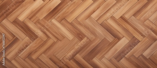 A close-up view of a wooden floor featuring a detailed herringle pattern