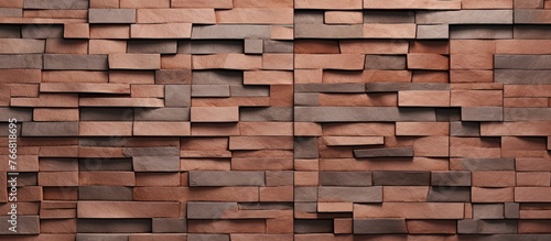 A closeup of a wooden block brick wall featuring a pattern of brown rectangles. The beige hardwood flooring creates a beautiful building material