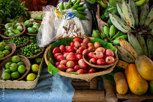 fresh produce on sale on floating market in Thainland photo