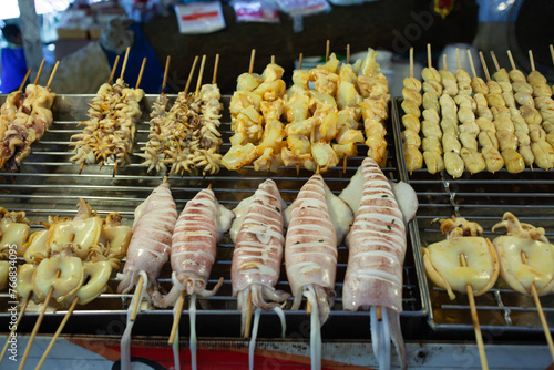 fresh produce on sale on floating market in Thainland photo