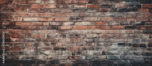 An image featuring a detailed view of a brick wall set against a simple black and white background