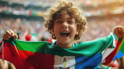 A happy fan at a public event in a stadium, holding an Italian flag with a smile and making a gesture, while enjoying the fun and leisure with a cheering crowd. AIG41