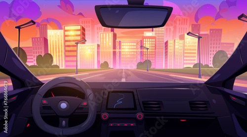 View from inside of driverless car through windshield on city landscape during sunset or sunrise. Vehicle dashboard with gps navigator and speedometer, steering wheel, mirror. Automobile ride to town.