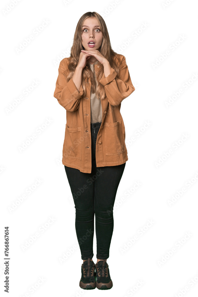 Studio portrait of a blonde Caucasian woman praying for luck, amazed and opening mouth looking to front. Studio portrait of a blonde Caucasian woman praying for luck, amazed and opening mouth looking to front.