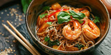 Asian Fusion: Spicy Shrimp Soba Noodles. A delectable bowl of spicy shrimp soba noodles, garnished with sliced scallions and chili, served with chopsticks.