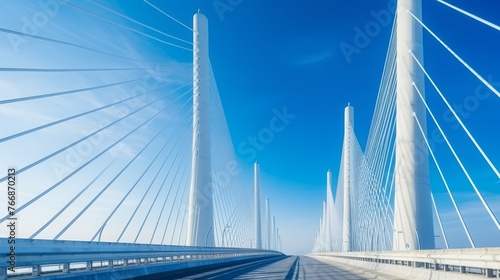 A High cable-stayed bridge with steel pylons. Backlight.