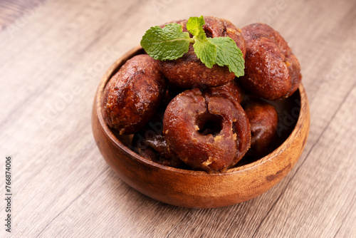 Close up of Kuih Keria Malaysian Sweet Potato Doughnut photo