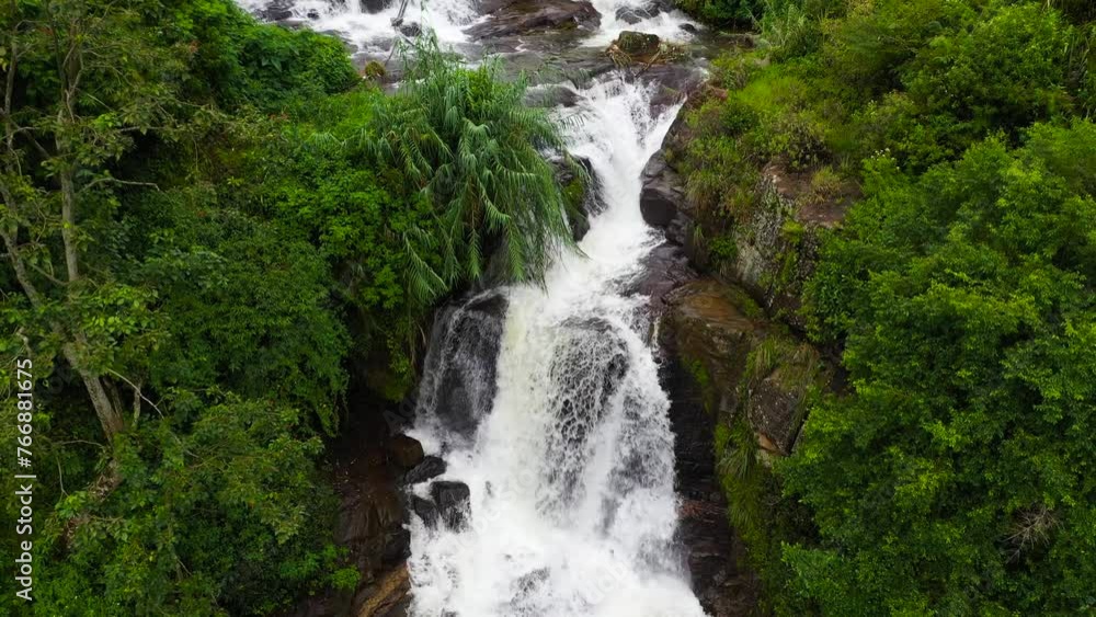 Waterfall in the tropical mountain jungle. Mount Vernon Waterfall, Sri Lanka. Waterfall in the tropical mountain jungle. Mount Vernon Waterfall, Sri Lanka.