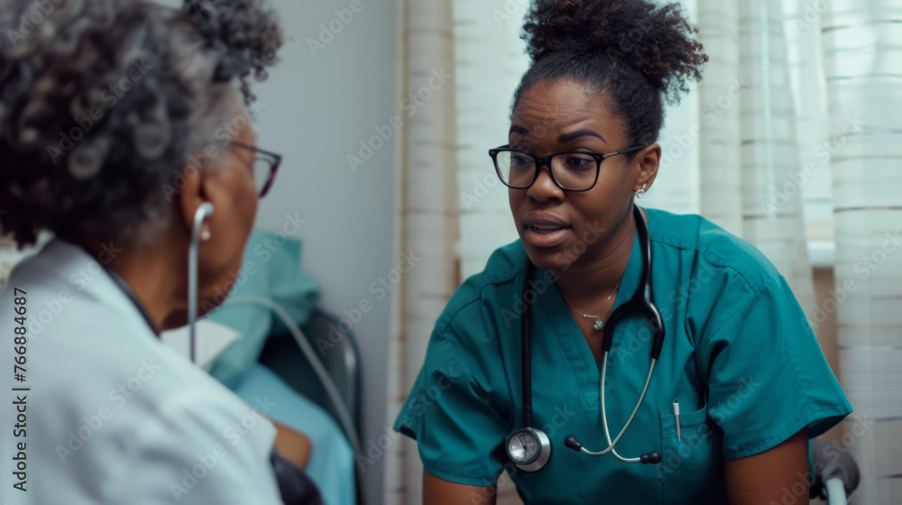 A nurse in scrubs listens intently to an older patient during a medical consultation. - obrazy, fototapety, plakaty 