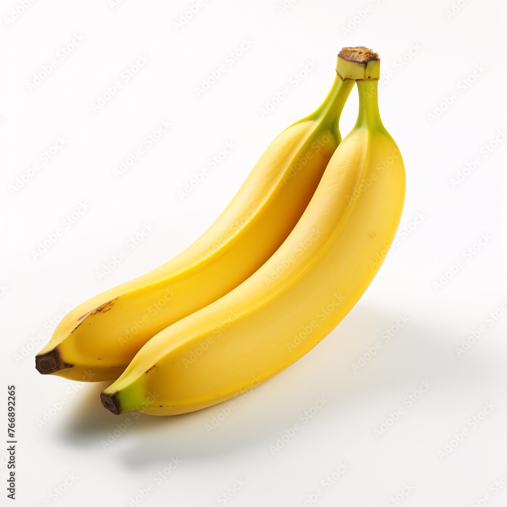 Yellow Banana on a plain white surface Yellow Banana on a plain white surface