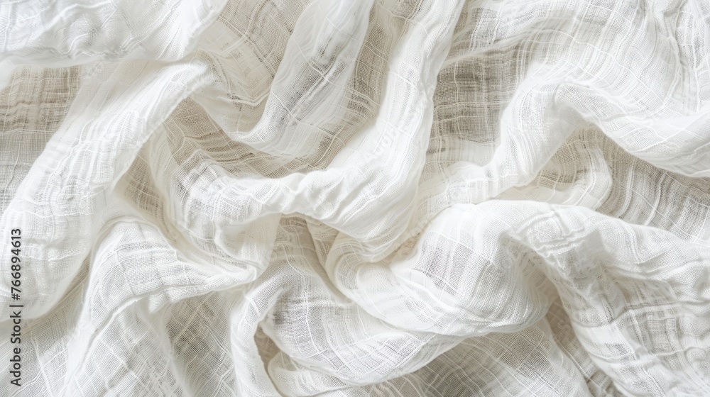 White crumpled linen fabric texture background.