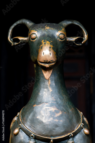 Bronze goat statue in Qingyang Palace, Chengdu, China. photo