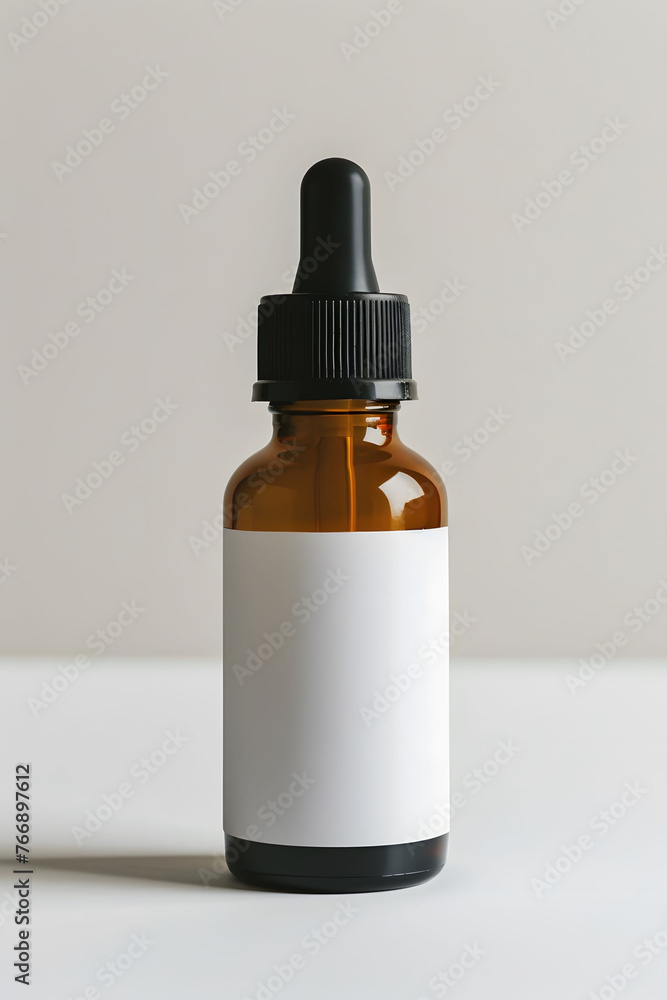 Amber dropper bottle with blank label on white  background