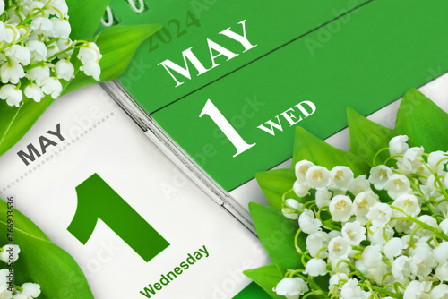 Green calendar 2024  May 1  Wednesday and flowers