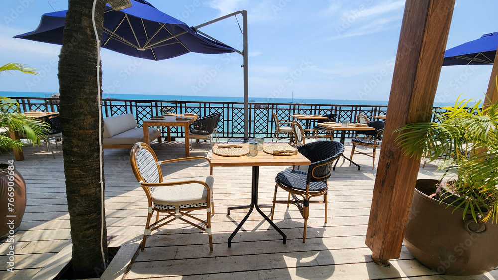 Fototapeta premium Tables in a restaurant near the beach