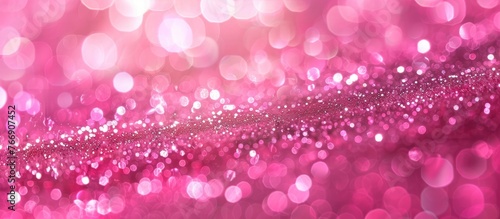 Pink glitter sparkles on abstract background ideal for party invitations.