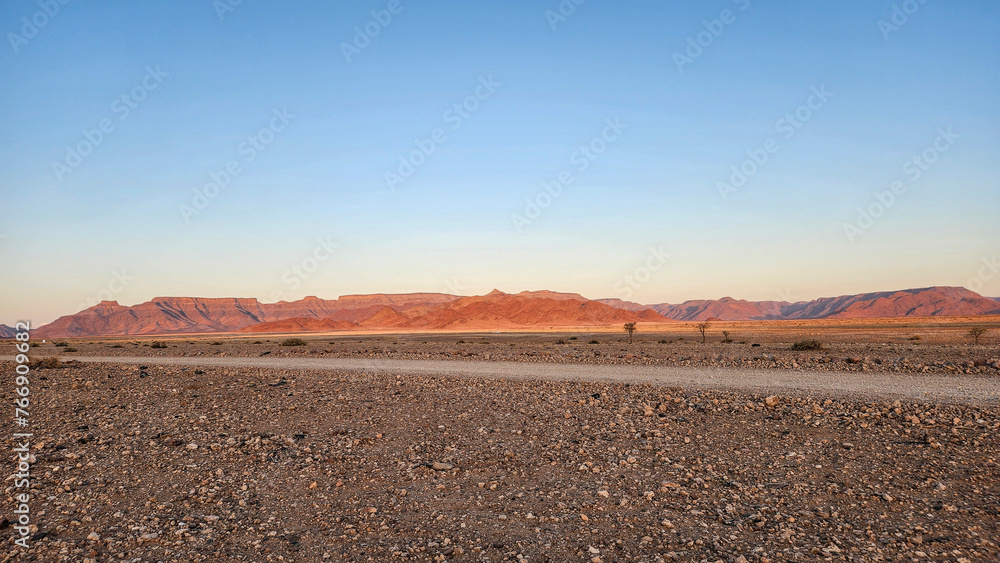 Most of Namibia's deserts are red due to the iron content in the sand.