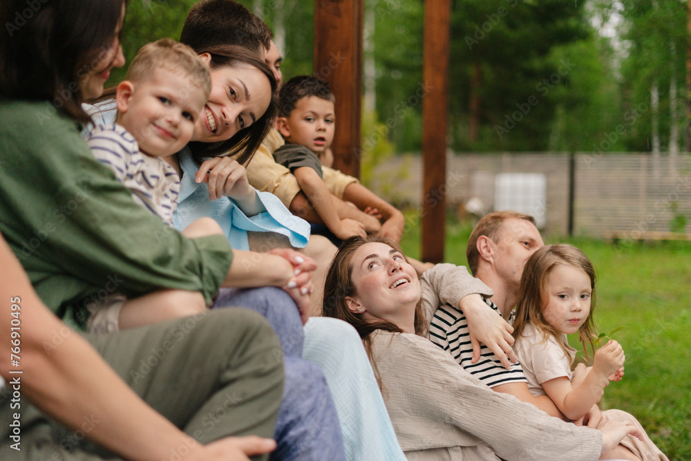 Happy family and friends gathering on summer vacation Happy family and friends gathering on summer vacation