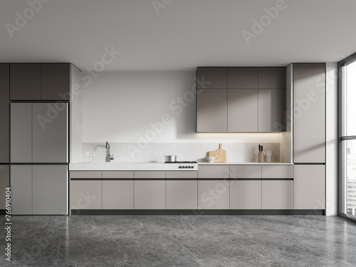 Modern home kitchen interior with cooking cabinet, fridge and panoramic window © ImageFlow