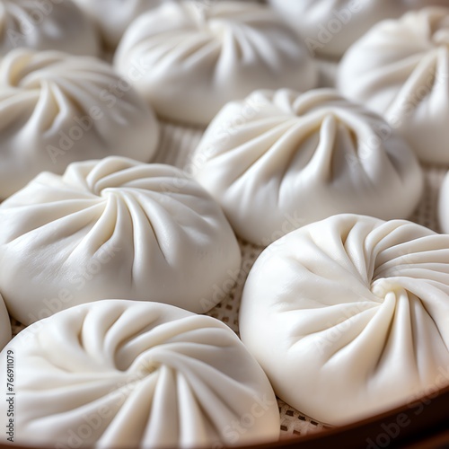 a group of dumplings on a tray