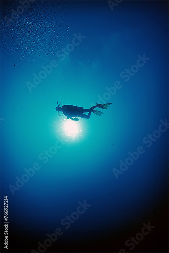 Fototapeta Naklejka Na Ścianę i Meble -  a diver exploring a reef on the island of Curacao