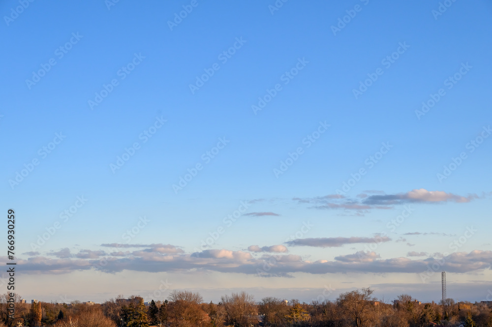 Fototapeta premium Dawn sky over the silhouette of Scarborough, Ontario, Canada
