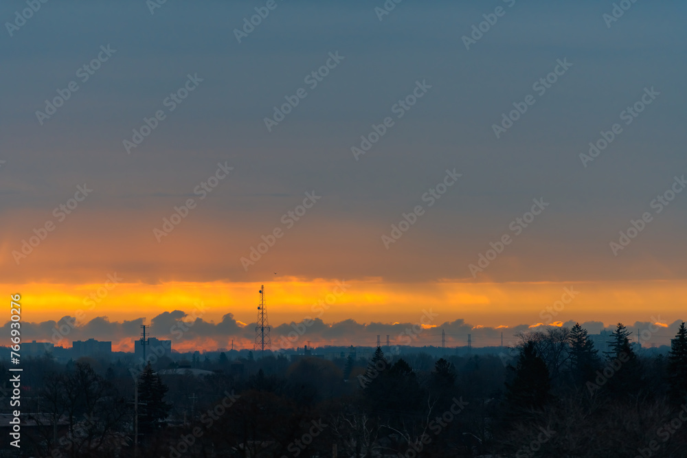 Dawn sky over the silhouette of Scarborough, Ontario, Canada